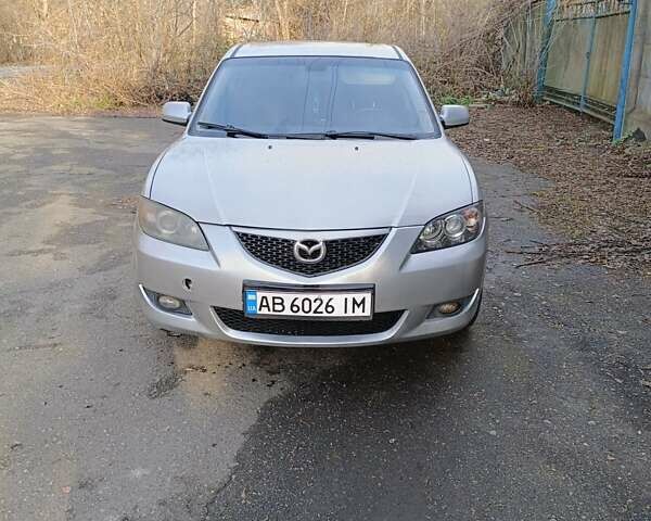 Серый Мазда 3, объемом двигателя 1.6 л и пробегом 383 тыс. км за 3400 $, фото 1 на Automoto.ua