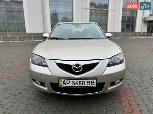 Серый Мазда 3, объемом двигателя 1.6 л и пробегом 165 тыс. км за 5000 $, фото 1 на Automoto.ua