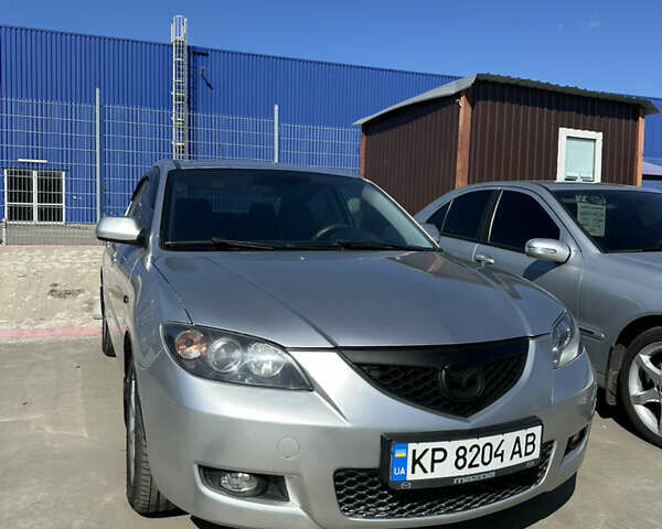 Серый Мазда 3, объемом двигателя 1.6 л и пробегом 194 тыс. км за 5500 $, фото 1 на Automoto.ua