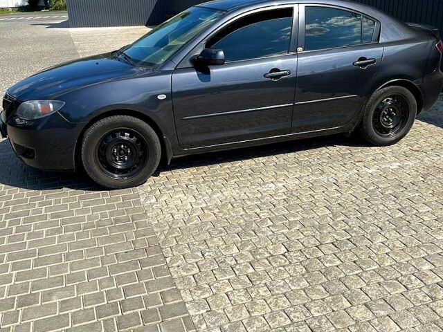 Серый Мазда 3, объемом двигателя 1.6 л и пробегом 203 тыс. км за 4500 $, фото 1 на Automoto.ua