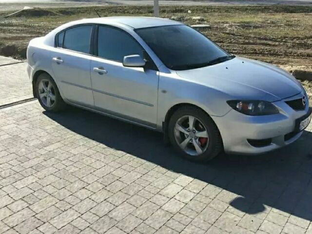 Серый Мазда 3, объемом двигателя 1.6 л и пробегом 250 тыс. км за 5500 $, фото 1 на Automoto.ua