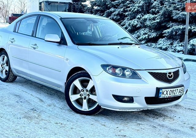 Серый Мазда 3, объемом двигателя 2 л и пробегом 235 тыс. км за 4100 $, фото 1 на Automoto.ua