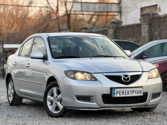 Серый Мазда 3, объемом двигателя 1.6 л и пробегом 244 тыс. км за 5800 $, фото 1 на Automoto.ua