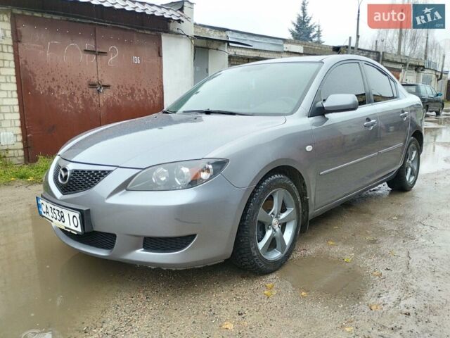 Серый Мазда 3, объемом двигателя 1.6 л и пробегом 238 тыс. км за 5150 $, фото 1 на Automoto.ua