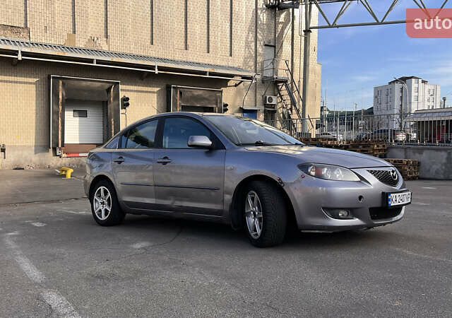 Серый Мазда 3, объемом двигателя 1.6 л и пробегом 220 тыс. км за 3500 $, фото 1 на Automoto.ua