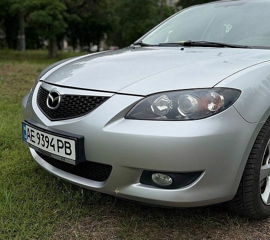 Серый Мазда 3, объемом двигателя 1.6 л и пробегом 143 тыс. км за 5000 $, фото 1 на Automoto.ua