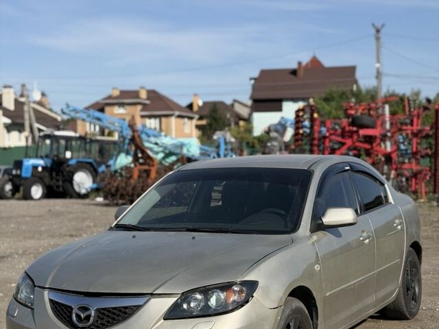 Серый Мазда 3, объемом двигателя 1.6 л и пробегом 290 тыс. км за 2692 $, фото 1 на Automoto.ua