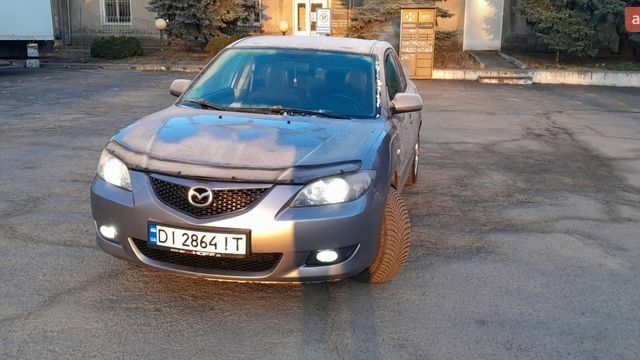 Серый Мазда 3, объемом двигателя 1.6 л и пробегом 259 тыс. км за 3550 $, фото 1 на Automoto.ua