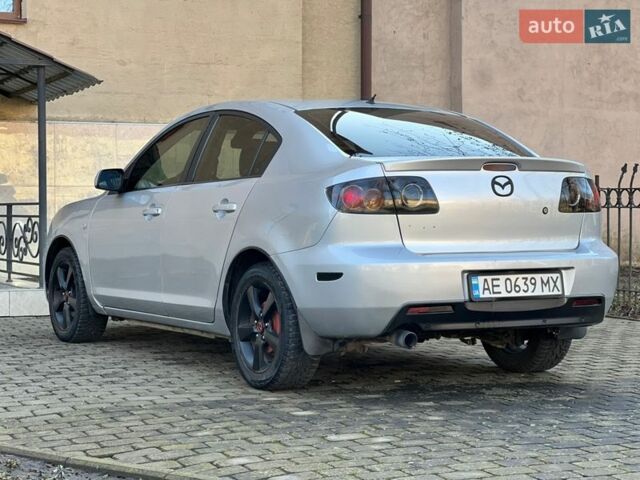 Серый Мазда 3, объемом двигателя 1.6 л и пробегом 200 тыс. км за 5400 $, фото 1 на Automoto.ua
