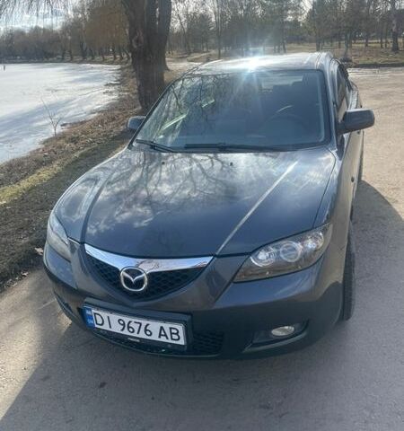 Серый Мазда 3, объемом двигателя 1.6 л и пробегом 275 тыс. км за 5500 $, фото 1 на Automoto.ua