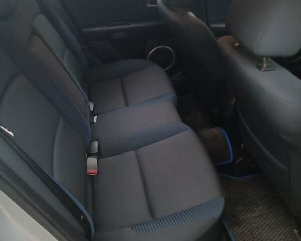 Серый Мазда 3, объемом двигателя 2 л и пробегом 300 тыс. км за 4500 $, фото 1 на Automoto.ua