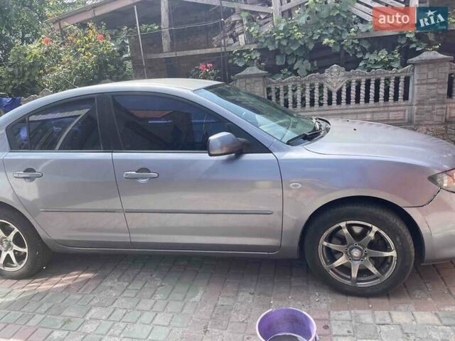 Серый Мазда 3, объемом двигателя 2 л и пробегом 139 тыс. км за 4500 $, фото 1 на Automoto.ua
