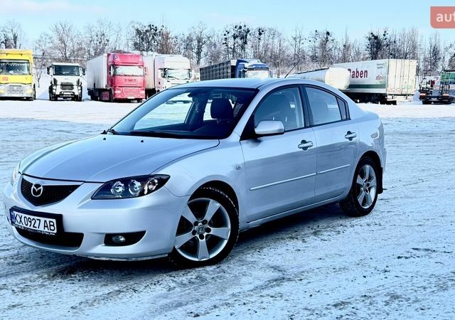 Сірий Мазда 3, об'ємом двигуна 2 л та пробігом 235 тис. км за 4100 $, фото 1 на Automoto.ua