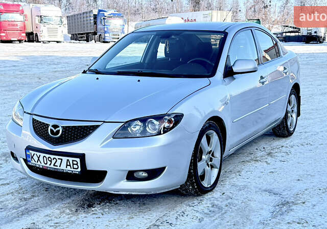 Сірий Мазда 3, об'ємом двигуна 2 л та пробігом 235 тис. км за 4299 $, фото 1 на Automoto.ua