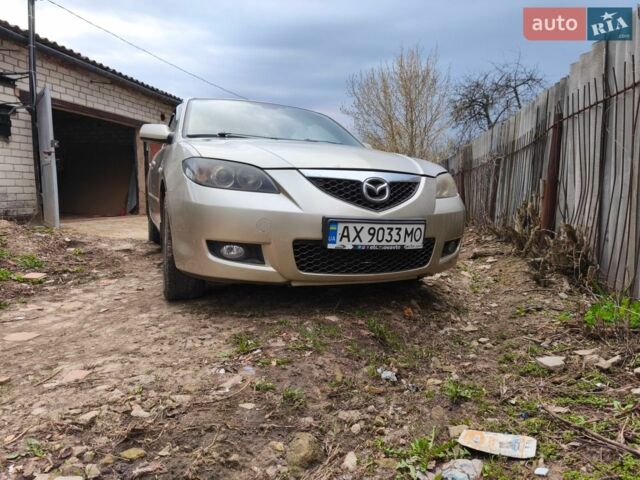 Серый Мазда 3, объемом двигателя 1.6 л и пробегом 297 тыс. км за 4800 $, фото 1 на Automoto.ua
