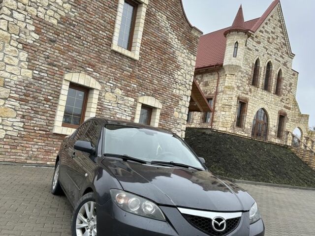 Серый Мазда 3, объемом двигателя 1.6 л и пробегом 310 тыс. км за 4400 $, фото 1 на Automoto.ua
