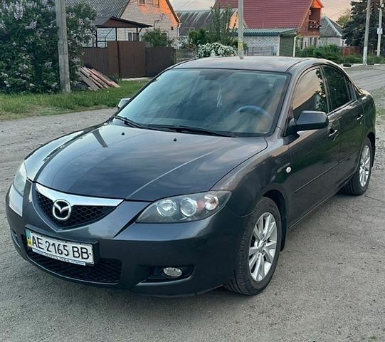 Серый Мазда 3, объемом двигателя 1.6 л и пробегом 270 тыс. км за 4499 $, фото 1 на Automoto.ua