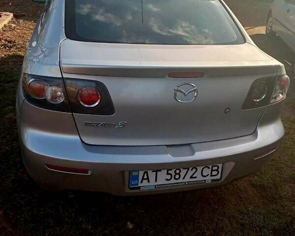 Серый Мазда 3, объемом двигателя 1.6 л и пробегом 258 тыс. км за 4200 $, фото 1 на Automoto.ua