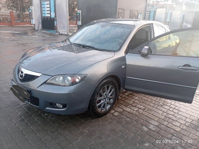 Серый Мазда 3, объемом двигателя 1.6 л и пробегом 270 тыс. км за 5000 $, фото 1 на Automoto.ua