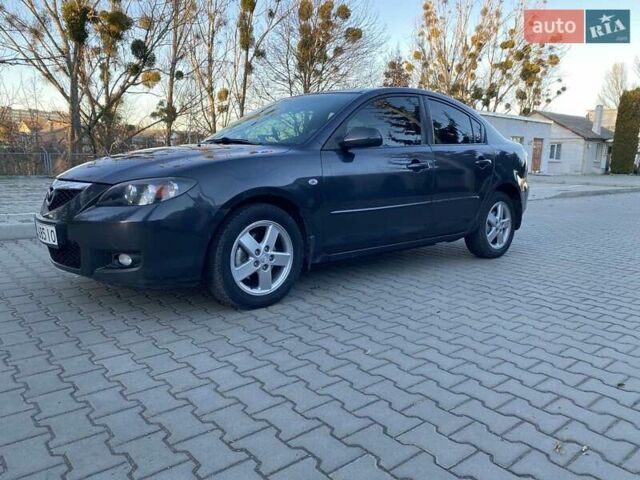 Серый Мазда 3, объемом двигателя 1.6 л и пробегом 170 тыс. км за 5250 $, фото 1 на Automoto.ua