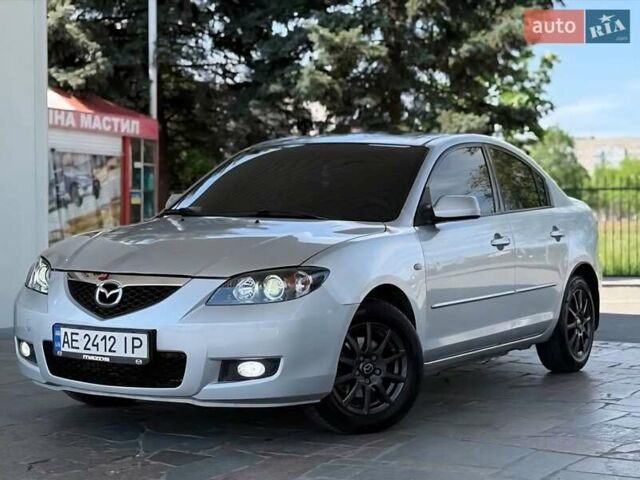 Серый Мазда 3, объемом двигателя 1.6 л и пробегом 135 тыс. км за 6400 $, фото 1 на Automoto.ua