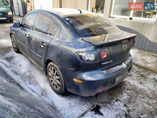 Серый Мазда 3, объемом двигателя 2 л и пробегом 318 тыс. км за 2100 $, фото 1 на Automoto.ua