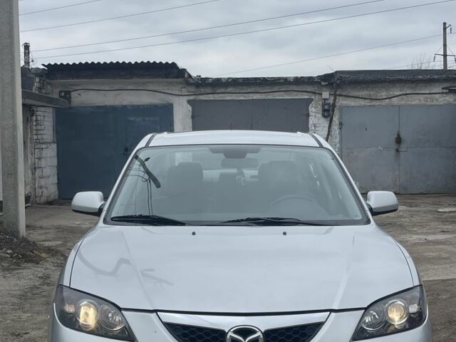 Серый Мазда 3, объемом двигателя 1.6 л и пробегом 232 тыс. км за 4900 $, фото 1 на Automoto.ua