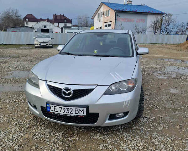 Серый Мазда 3, объемом двигателя 1.6 л и пробегом 223 тыс. км за 3950 $, фото 1 на Automoto.ua