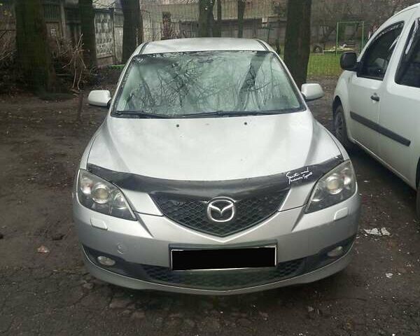 Серый Мазда 3, объемом двигателя 1.6 л и пробегом 175 тыс. км за 5500 $, фото 1 на Automoto.ua