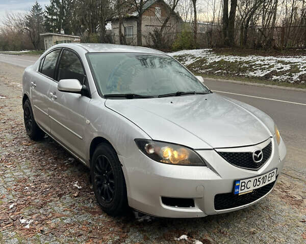 Серый Мазда 3, объемом двигателя 1.6 л и пробегом 212 тыс. км за 2700 $, фото 1 на Automoto.ua