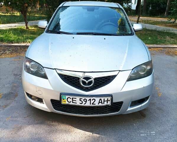 Серый Мазда 3, объемом двигателя 1.6 л и пробегом 225 тыс. км за 3000 $, фото 1 на Automoto.ua