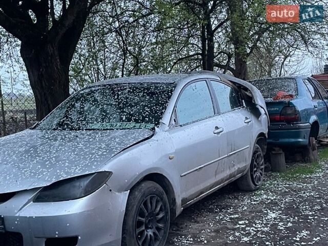 Серый Мазда 3, объемом двигателя 1.6 л и пробегом 221 тыс. км за 480 $, фото 1 на Automoto.ua