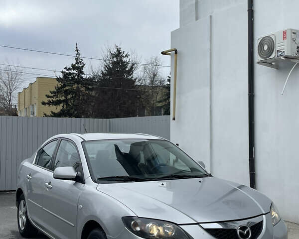 Серый Мазда 3, объемом двигателя 1.6 л и пробегом 317 тыс. км за 5300 $, фото 1 на Automoto.ua