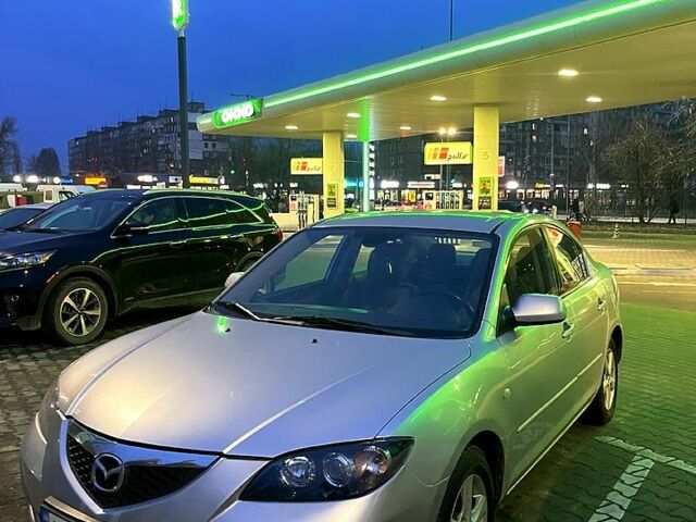 Серый Мазда 3, объемом двигателя 1.6 л и пробегом 232 тыс. км за 4900 $, фото 1 на Automoto.ua
