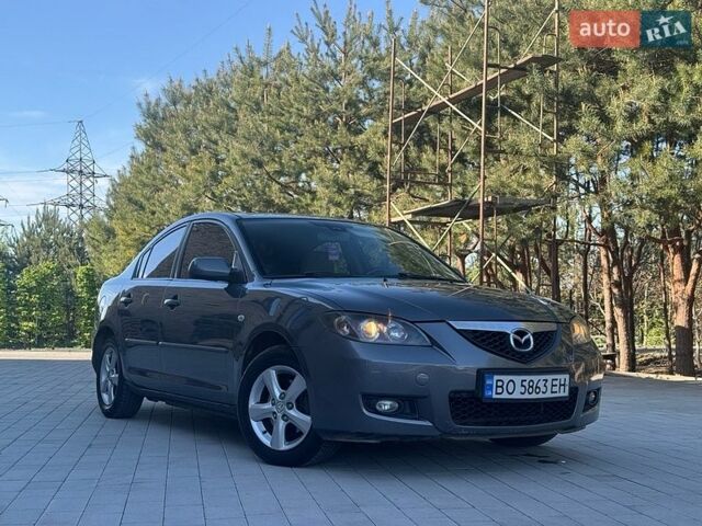 Серый Мазда 3, объемом двигателя 1.6 л и пробегом 220 тыс. км за 3850 $, фото 1 на Automoto.ua