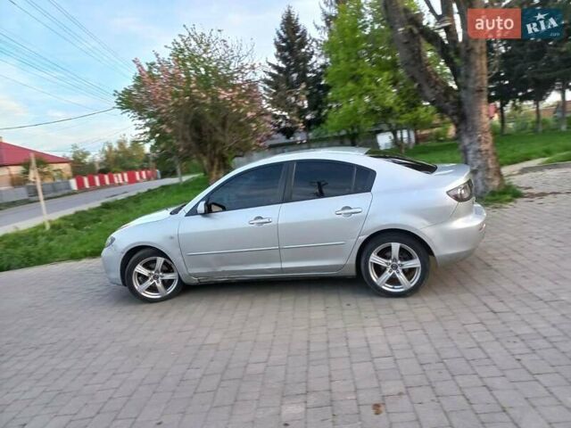 Серый Мазда 3, объемом двигателя 1.6 л и пробегом 396 тыс. км за 4400 $, фото 1 на Automoto.ua