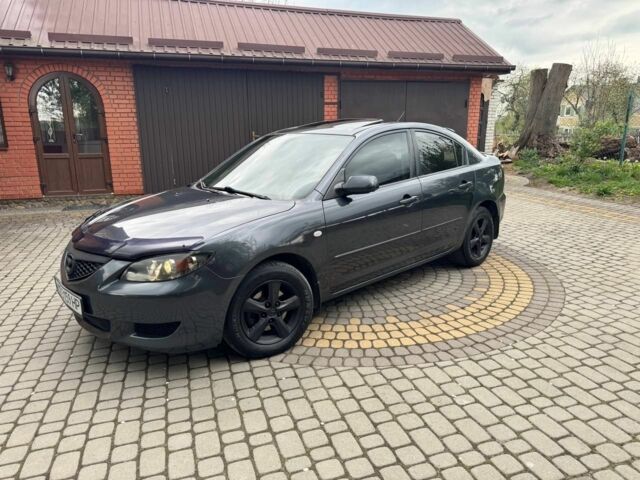 Серый Мазда 3, объемом двигателя 1.6 л и пробегом 255 тыс. км за 3800 $, фото 1 на Automoto.ua