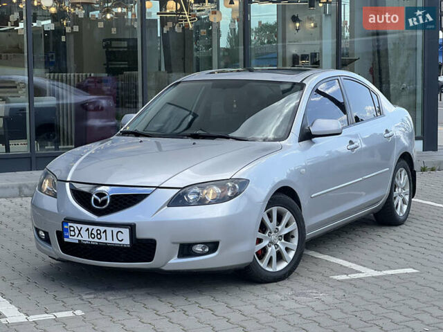 Серый Мазда 3, объемом двигателя 1.6 л и пробегом 255 тыс. км за 5600 $, фото 1 на Automoto.ua