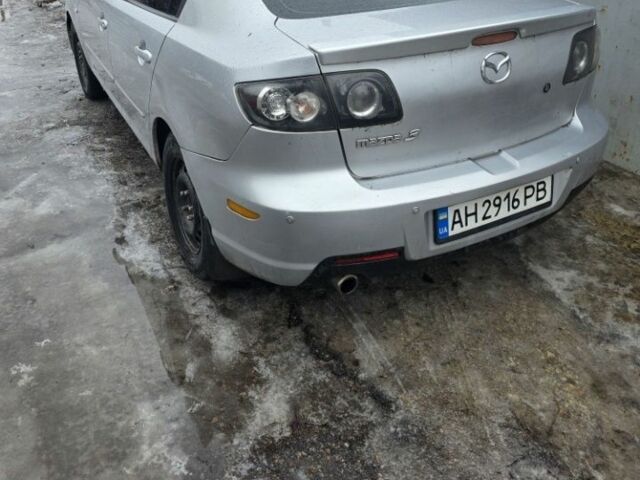 Серый Мазда 3, объемом двигателя 2 л и пробегом 243 тыс. км за 4200 $, фото 1 на Automoto.ua