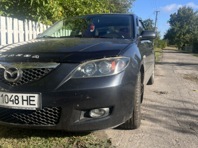 Серый Мазда 3, объемом двигателя 1.6 л и пробегом 222 тыс. км за 5800 $, фото 1 на Automoto.ua