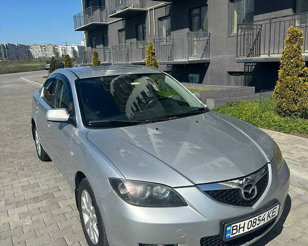 Серый Мазда 3, объемом двигателя 1.6 л и пробегом 243 тыс. км за 5600 $, фото 1 на Automoto.ua