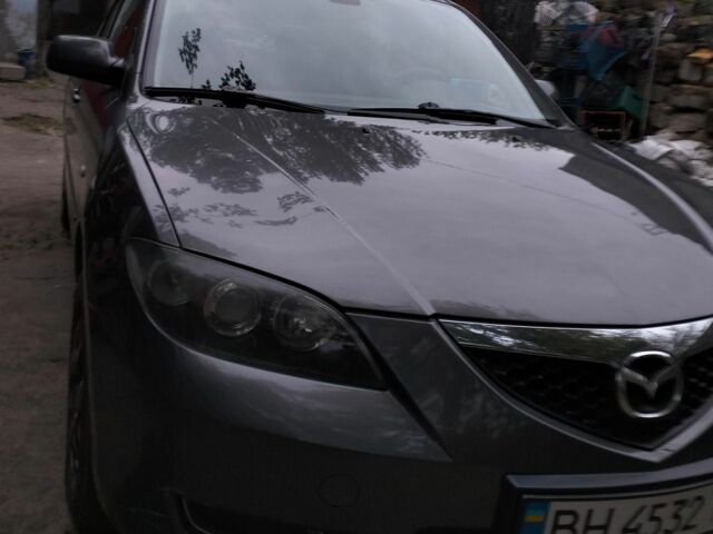 Серый Мазда 3, объемом двигателя 1.6 л и пробегом 288 тыс. км за 5000 $, фото 1 на Automoto.ua