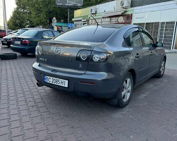 Сірий Мазда 3, об'ємом двигуна 1.6 л та пробігом 235 тис. км за 3800 $, фото 1 на Automoto.ua