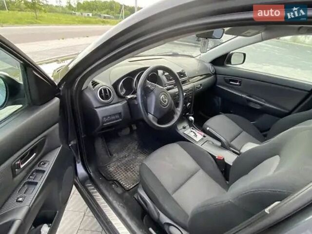 Серый Мазда 3, объемом двигателя 1.6 л и пробегом 170 тыс. км за 5000 $, фото 1 на Automoto.ua