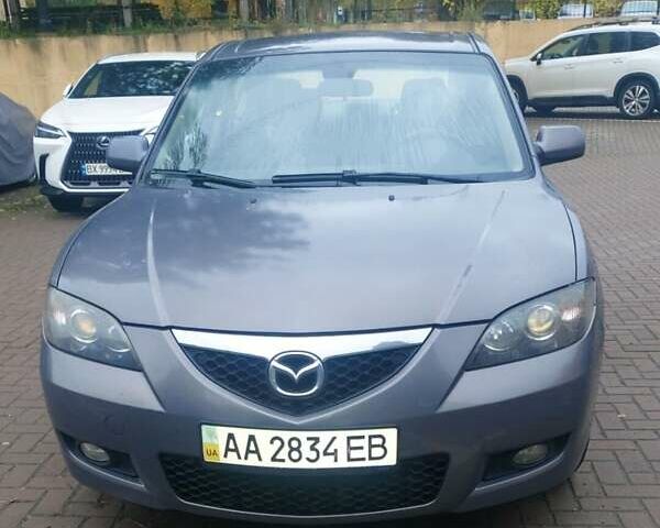 Серый Мазда 3, объемом двигателя 1.6 л и пробегом 250 тыс. км за 5400 $, фото 1 на Automoto.ua