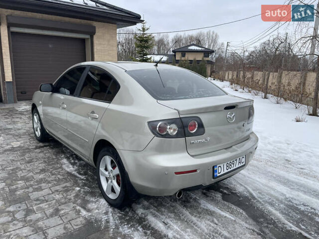 Серый Мазда 3, объемом двигателя 2 л и пробегом 310 тыс. км за 3950 $, фото 1 на Automoto.ua