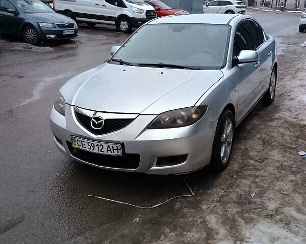 Серый Мазда 3, объемом двигателя 1.6 л и пробегом 225 тыс. км за 3800 $, фото 1 на Automoto.ua