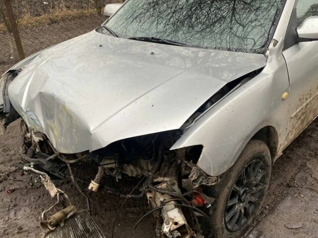 Серый Мазда 3, объемом двигателя 1.6 л и пробегом 220 тыс. км за 444 $, фото 1 на Automoto.ua