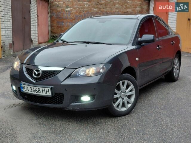 Серый Мазда 3, объемом двигателя 1.6 л и пробегом 248 тыс. км за 5900 $, фото 1 на Automoto.ua