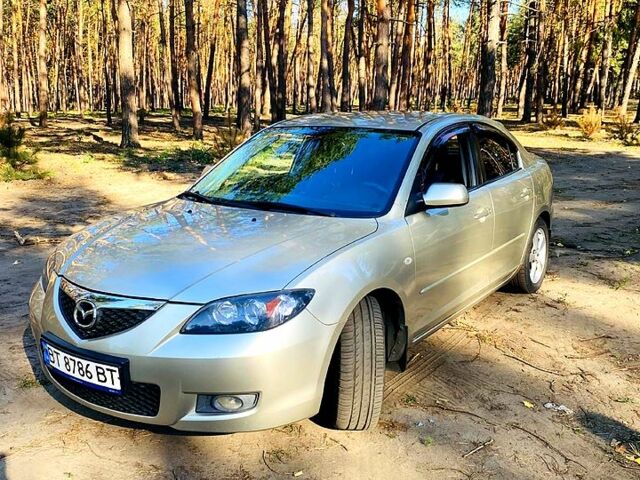 Серый Мазда 3, объемом двигателя 1.6 л и пробегом 249 тыс. км за 4700 $, фото 1 на Automoto.ua
